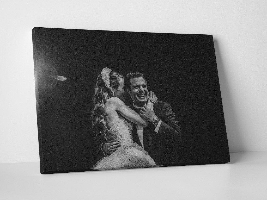 Photo of the bride and groom's wedding first dance printed in black and white on rectangular canvas.  